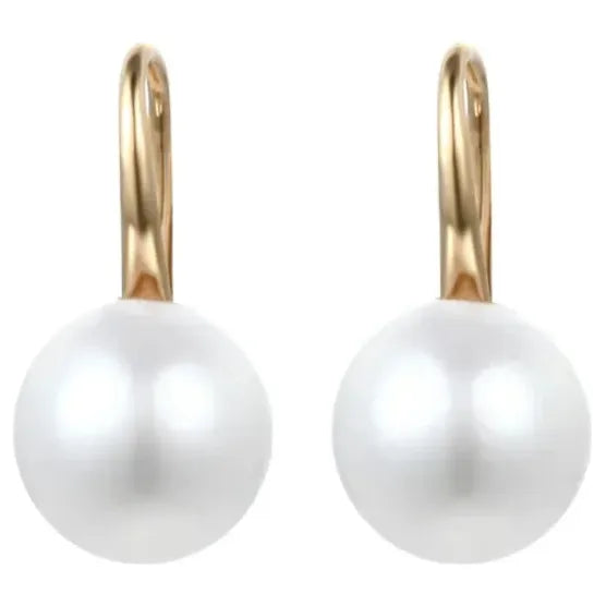 Elegant silver drop earrings with luminous freshwater pearls, ideal for earrings piercing, jewelry storage, vintage jewelry collections, and gifting. Perfect for jewelry websites or body jewelry enthusiasts.