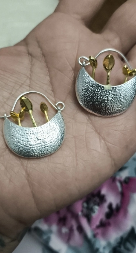 Elegant silver and gold leaf earrings showcasing unique jewelry designers' artistry, perfect for vintage jewelry websites, jewelry storage, and gift for mom.