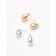 Teardrop stud earrings in rose gold and silver, perfect for jewelry storage, earrings piercing, and jewelry websites. Elegant design for body jewelry lovers and jewelry designers.
