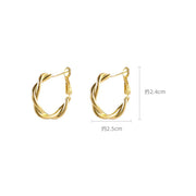 Elegant twisted gold hoop earrings for body jewelry enthusiasts, perfect for jewelry storage in a jewelry case. Ideal for mature women hairstyles or earrings piercing, these earrings rings are a timeless choice for jewelry websites and jewelry designers. Great gift idea for mom or vintage jewelry collectors. Discover the beauty of diamond and jewelry with this versatile accessory