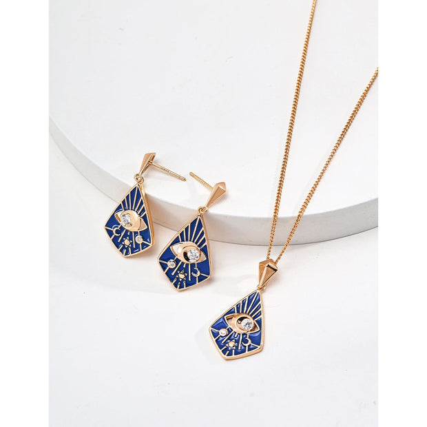 Gold drop earrings with bold blue enamel design, crystal accents, and eye motif, perfect for jewelry storage, designed by top jewelry designers. Ideal for earrings piercing, vintage jewelry collections, jewelry for mom, body jewelry, and gem jewelry. A standout piece for jewelry websites and cases.