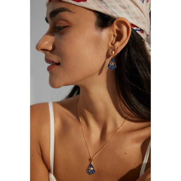 Gold drop earrings with bold blue enamel design, crystal accents, and eye motif, perfect for jewelry storage, designed by top jewelry designers. Ideal for earrings piercing, vintage jewelry collections, jewelry for mom, body jewelry, and gem jewelry. A standout piece for jewelry websites and cases.