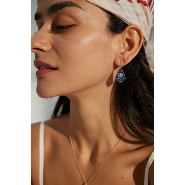 Gold drop earrings with bold blue enamel design, crystal accents, and eye motif, perfect for jewelry storage, designed by top jewelry designers. Ideal for earrings piercing, vintage jewelry collections, jewelry for mom, body jewelry, and gem jewelry. A standout piece for jewelry websites and cases.