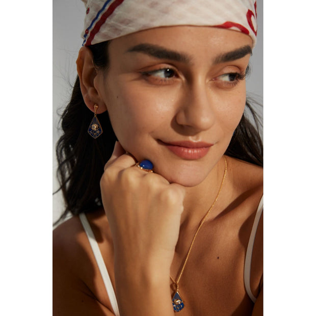 Gold drop earrings with bold blue enamel design, crystal accents, and eye motif, perfect for jewelry storage, designed by top jewelry designers. Ideal for earrings piercing, vintage jewelry collections, jewelry for mom, body jewelry, and gem jewelry. A standout piece for jewelry websites and cases.