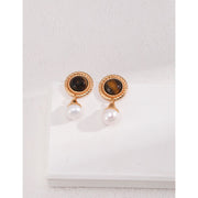 Gold drop earrings with tiger eye gemstones and pearl accents, perfect for vintage jewelry, jewelry storage, jewelry websites, and elegant jewelry for mom.