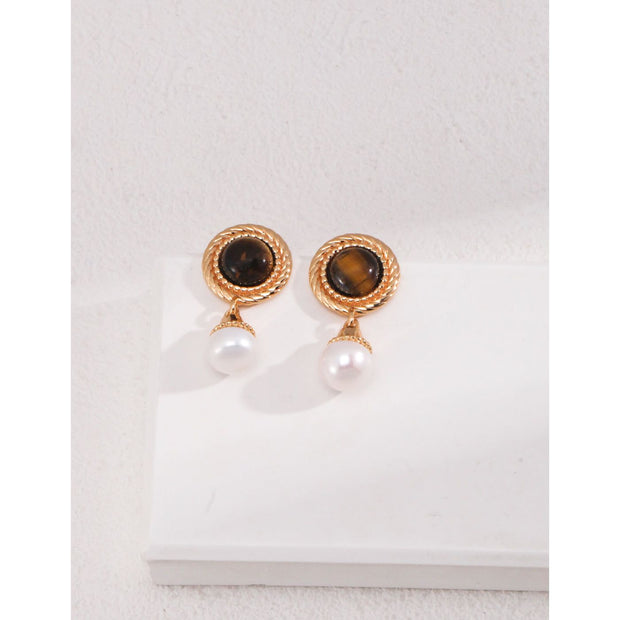 Gold drop earrings with tiger eye gemstones and pearl accents, perfect for vintage jewelry, jewelry storage, jewelry websites, and elegant jewelry for mom.