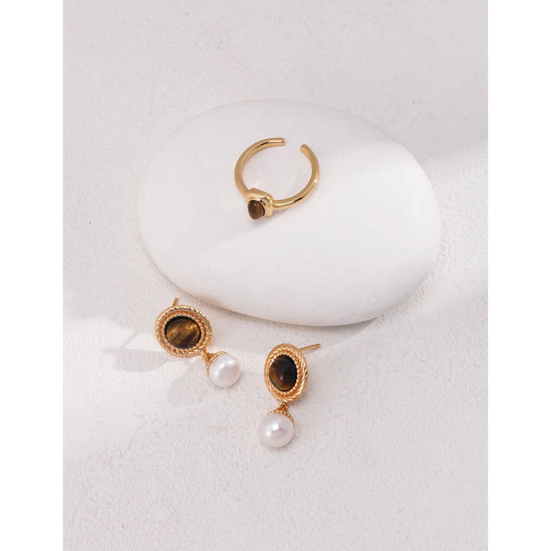 Gold drop earrings with tiger eye gemstones and pearl accents, perfect for vintage jewelry, jewelry storage, jewelry websites, and elegant jewelry for mom.