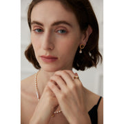 Gold drop earrings with tiger eye gemstones and pearl accents, perfect for vintage jewelry, jewelry storage, jewelry websites, and elegant jewelry for mom.