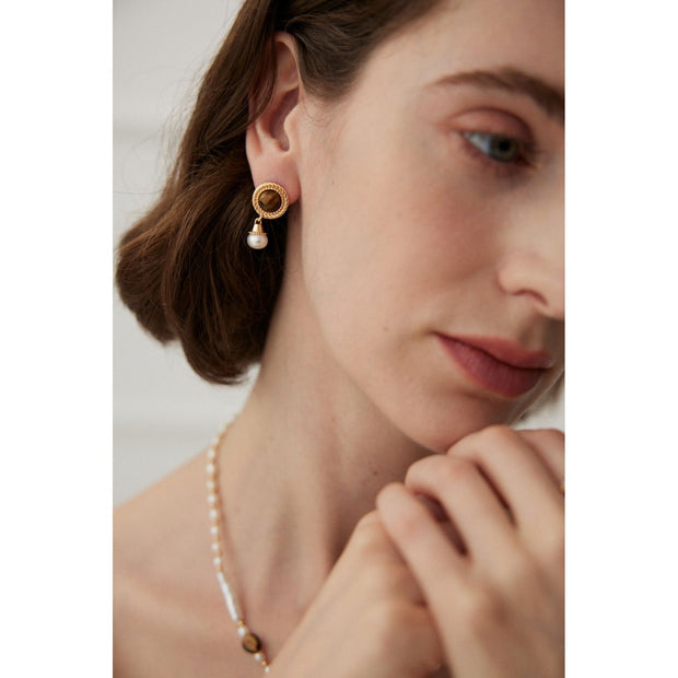 Gold drop earrings with tiger eye gemstones and pearl accents, perfect for vintage jewelry, jewelry storage, jewelry websites, and elegant jewelry for mom.