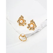 Vintage gold floral pearl earrings for jewelry storage and jewelry case lovers. Ideal for jewelry designers, earrings piercing, and fans of vintage jewelry styles.