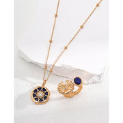 Elegant gold flower and blue gemstone rings on display – perfect for jewelry storage, designed by leading jewelry designers. Great addition to vintage jewelry collections, earrings rings sets, and jewelry with turquoise. Explore diamond and jewelry trends, body jewelry plus accessories, and name of jewelry stones for your personal or gift needs.