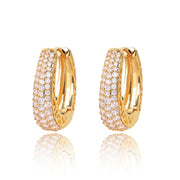 Gold hoop earrings with sparkling crystals and filigree design, perfect for jewelry websites, jewelry storage, vintage jewelry, and gifting for mom.