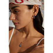 Gold necklace with blue enamel eye pendant and crystal accents, ideal for jewelry storage, crafted by top jewelry designers. Perfect for jewelry websites, vintage jewelry collections, jewelry for mom, and gem jewelry lovers. A standout accessory for body jewelry and jewelry with engraving.