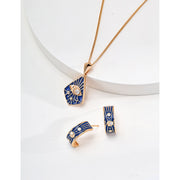 Gold necklace with blue enamel eye pendant and crystal accents, ideal for jewelry storage, crafted by top jewelry designers. Perfect for jewelry websites, vintage jewelry collections, jewelry for mom, and gem jewelry lovers. A standout accessory for body jewelry and jewelry with engraving.