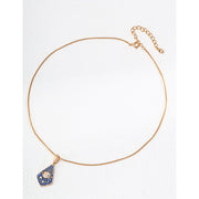 Gold necklace with blue enamel eye pendant and crystal accents, ideal for jewelry storage, crafted by top jewelry designers. Perfect for jewelry websites, vintage jewelry collections, jewelry for mom, and gem jewelry lovers. A standout accessory for body jewelry and jewelry with engraving.