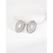 Gold oval pearl earrings with intricate lattice design on a white surface, ideal for vintage jewelry lovers, jewelry websites, and jewelry storage ideas. A perfect accessory for mature women hairstyles, earrings rings combinations, and showcasing gem jewelry or diamond and jewelry pieces.