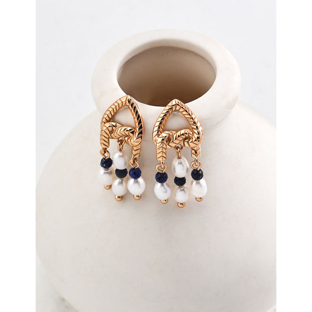 Elegant gold-tone earrings with pearls and navy beads, perfect for vintage jewelry enthusiasts, jewelry designers, and fans of earrings rings and piercing styles.