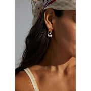 Elegant gold-tone earrings with pearls and navy beads, perfect for vintage jewelry enthusiasts, jewelry designers, and fans of earrings rings and piercing styles.