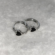 Gold hoop earrings with delicate pearls, ideal for jewelry storage, jewelry cleaning, and showcasing on jewelry websites by top jewelry designers for timeless style.