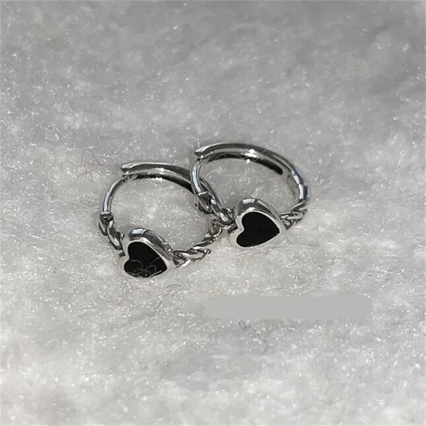 Gold hoop earrings with delicate pearls, ideal for jewelry storage, jewelry cleaning, and showcasing on jewelry websites by top jewelry designers for timeless style.