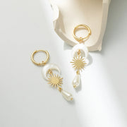 Elegant gold shell earrings for modern jewelry storage and display, designed by top jewelry designers. Ideal for jewelry websites featuring body jewelry, earrings rings, or vintage-inspired collections. Perfect for jewelry case organization, showcasing diamond and jewelry craftsmanship, and suitable for mature women hairstyles. A standout piece for jewelry cleaning and care enthusiasts.