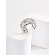 Gold and silver cuff rings with intricate detailing on a white surface, perfect for vintage jewelry collectors, jewelry designers, and jewelry websites. Ideal for jewelry storage, jewelry cases, and pairing with earrings rings or gem jewelry styles. A must-have for those seeking jewelry cleaning tips or diamond and jewelry care.