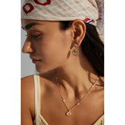 Gold and silver drop earrings with crystal accents, ideal for jewelry designers, jewelry websites, and jewelry storage. Perfect for vintage jewelry lovers, earrings rings combinations, and pairing with mature women hairstyles. A must-have for gem jewelry collections and diamond and jewelry enthusiasts.