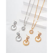 Gold and silver drop earrings with crystal accents, ideal for jewelry designers, jewelry websites, and jewelry storage. Perfect for vintage jewelry lovers, earrings rings combinations, and pairing with mature women hairstyles. A must-have for gem jewelry collections and diamond and jewelry enthusiasts.