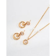 Gold and silver drop earrings with crystal accents, ideal for jewelry designers, jewelry websites, and jewelry storage. Perfect for vintage jewelry lovers, earrings rings combinations, and pairing with mature women hairstyles. A must-have for gem jewelry collections and diamond and jewelry enthusiasts.