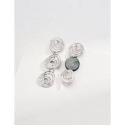 Elegant gold and silver swirl drop earrings with abalone accents, perfect for jewelry storage, designed by top jewelry designers, ideal for earrings piercing or gifting. Great addition to vintage jewelry collections, suitable for body jewelry, jewelry for mom, and jewelry with turquoise or engraving.