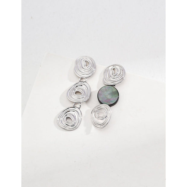Elegant gold and silver swirl drop earrings with abalone accents, perfect for jewelry storage, designed by top jewelry designers, ideal for earrings piercing or gifting. Great addition to vintage jewelry collections, suitable for body jewelry, jewelry for mom, and jewelry with turquoise or engraving.