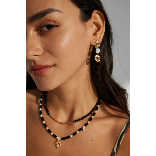 Elegant gold and silver swirl drop earrings with abalone accents, perfect for jewelry storage, designed by top jewelry designers, ideal for earrings piercing or gifting. Great addition to vintage jewelry collections, suitable for body jewelry, jewelry for mom, and jewelry with turquoise or engraving.