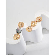 Elegant gold and silver swirl drop earrings with abalone accents, perfect for jewelry storage, designed by top jewelry designers, ideal for earrings piercing or gifting. Great addition to vintage jewelry collections, suitable for body jewelry, jewelry for mom, and jewelry with turquoise or engraving.