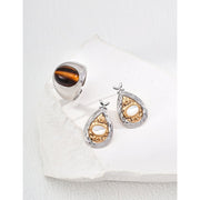 Gold and silver teardrop pearl earrings with intricate detailing, perfect for vintage jewelry lovers, jewelry designers, and jewelry websites. Ideal for jewelry storage, pairing with mature women hairstyles, and showcasing gem jewelry or diamond and jewelry collections.