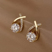 Elegant gold and diamond stud earrings, ideal for earrings piercing, jewelry storage, jewelry websites, vintage jewelry, and gifting for mom or jewelry lovers.