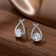 Elegant gold and diamond stud earrings, ideal for earrings piercing, jewelry storage, jewelry websites, vintage jewelry, and gifting for mom or jewelry lovers.