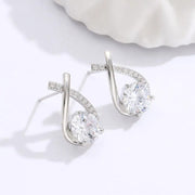 Elegant gold and diamond stud earrings, ideal for earrings piercing, jewelry storage, jewelry websites, vintage jewelry, and gifting for mom or jewelry lovers.