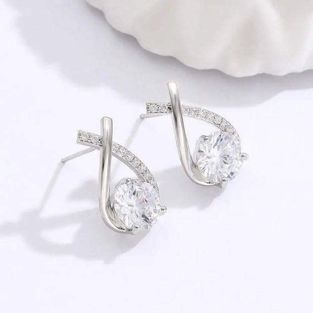 Elegant gold and diamond stud earrings, ideal for earrings piercing, jewelry storage, jewelry websites, vintage jewelry, and gifting for mom or jewelry lovers.