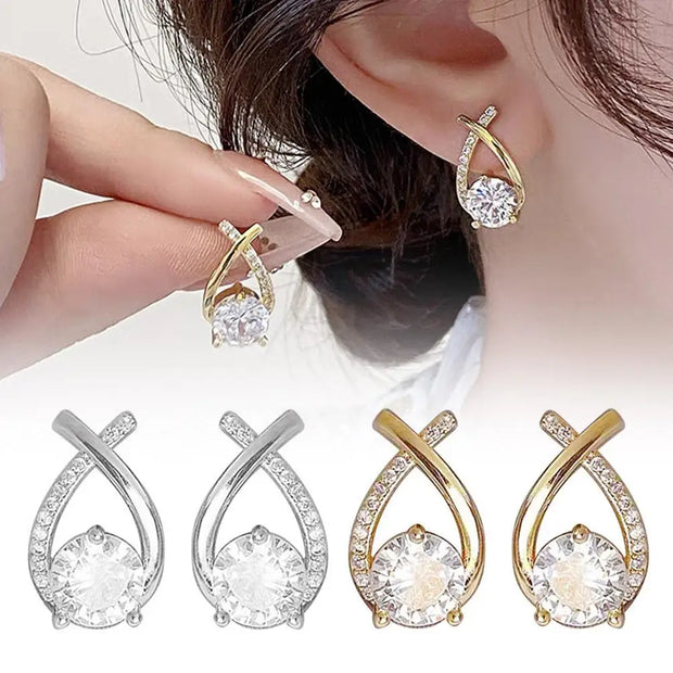 Elegant gold and diamond stud earrings, ideal for earrings piercing, jewelry storage, jewelry websites, vintage jewelry, and gifting for mom or jewelry lovers.