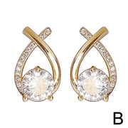 Elegant gold and diamond stud earrings, ideal for earrings piercing, jewelry storage, jewelry websites, vintage jewelry, and gifting for mom or jewelry lovers.