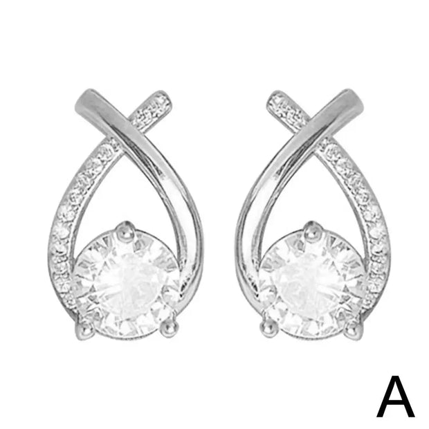 Elegant gold and diamond stud earrings, ideal for earrings piercing, jewelry storage, jewelry websites, vintage jewelry, and gifting for mom or jewelry lovers.