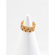 Gold and silver adjustable rings with floral designs, ideal for jewelry storage, jewelry websites, vintage jewelry collections, and gifting timeless accessories.