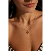 Gold and silver heart pendant necklaces with textured designs, perfect for jewelry storage, jewelry websites, vintage jewelry collections, and thoughtful gifting.