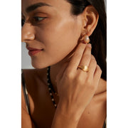 Gold and silver textured hoop earrings, perfect for jewelry storage, jewelry websites, vintage jewelry collections, and stylish accessories for all occasions.