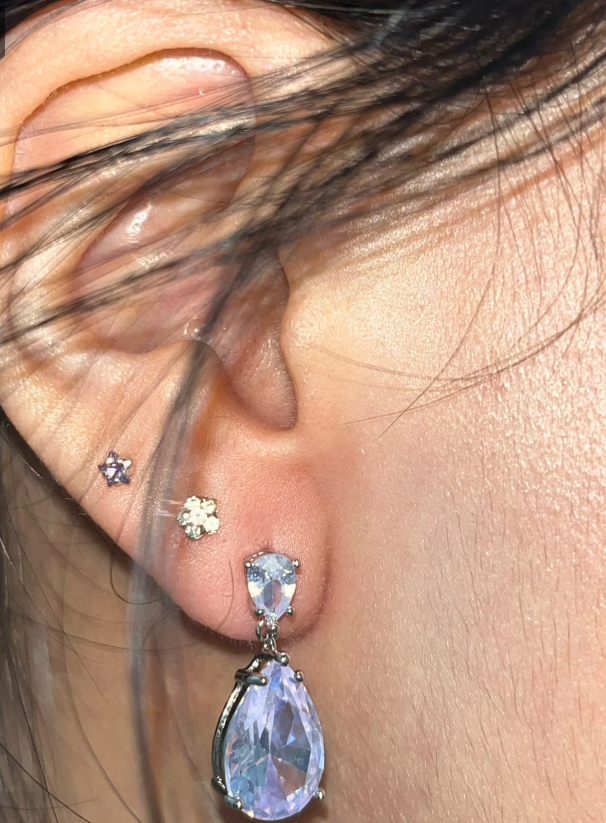 Elegant diamond drop earrings for jewelry designers, featuring teardrop design with sparkling diamonds, perfect for luxury jewelry websites, cases, and storage.