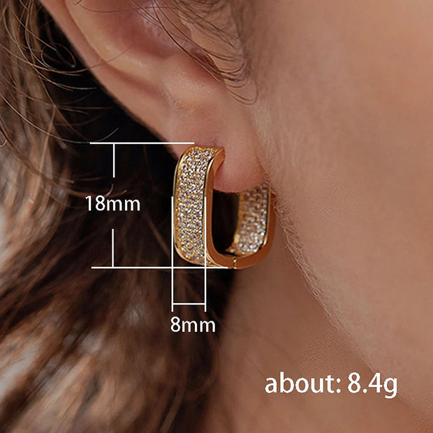 Luxury gold diamond hoop earrings for earrings piercing, jewelry storage, jewelry websites, and gifting. Perfect for diamond and jewelry lovers and elegant styles.