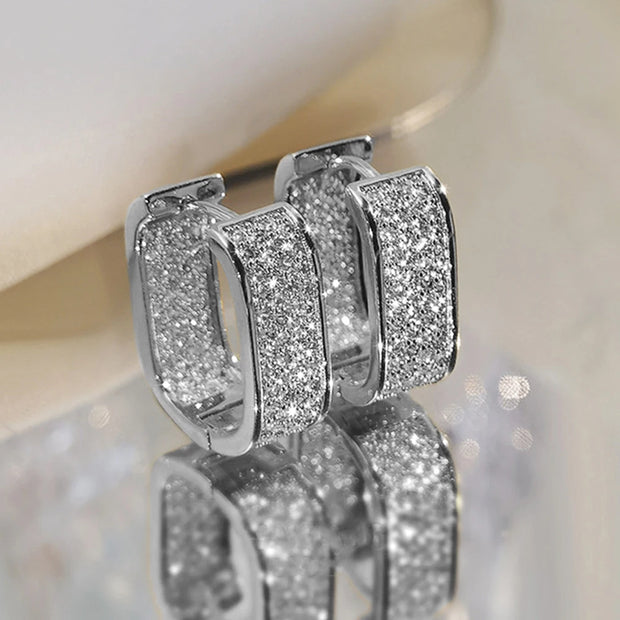 Luxury gold diamond hoop earrings for earrings piercing, jewelry storage, jewelry websites, and gifting. Perfect for diamond and jewelry lovers and elegant styles.