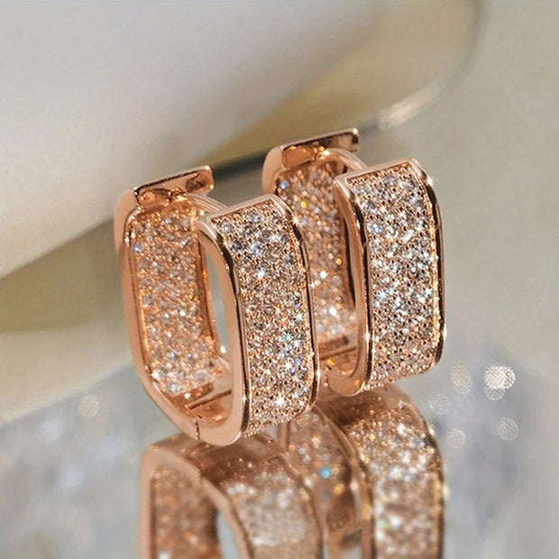 Luxury gold diamond hoop earrings for earrings piercing, jewelry storage, jewelry websites, and gifting. Perfect for diamond and jewelry lovers and elegant styles.