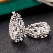 Vintage silver filigree hoop earrings with intricate designs, ideal for jewelry websites, jewelry storage, vintage jewelry collections, and gifting for mom.