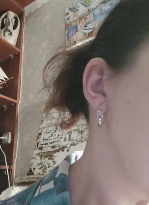 Vintage silver filigree hoop earrings with intricate designs, ideal for jewelry websites, jewelry storage, vintage jewelry collections, and gifting for mom.